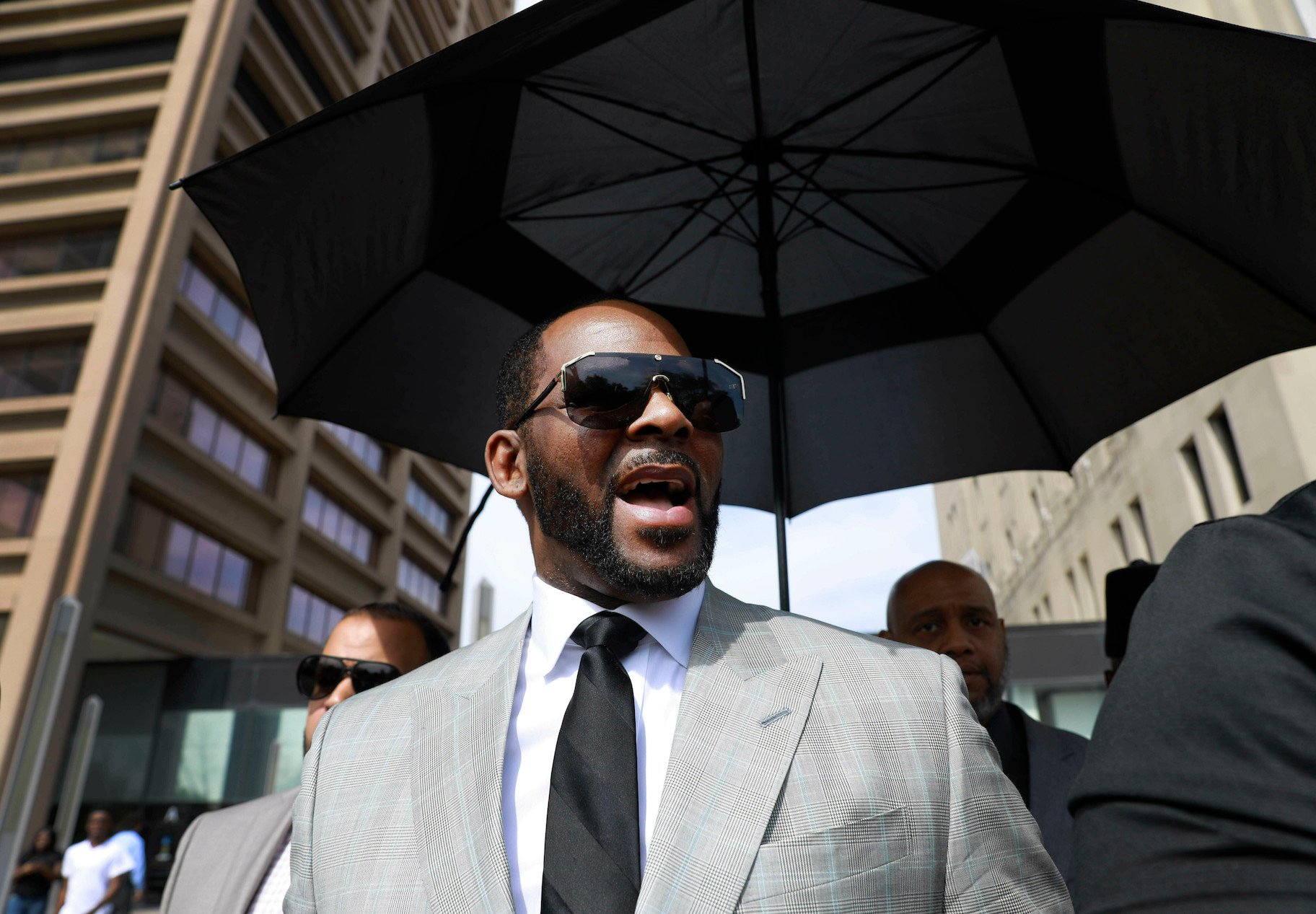 In this June 6, 2019 file photo, musician R. Kelly departs the Leighton Criminal Court building after pleading not guilty to 11 additional sex-related charges in Chicago. A U.S. Attorney’s office spokesman says Kelly was arrested Thursday night, July 11 on federal sex-crime charges in Chicago. (AP Photo/Amr Alfiky, File)