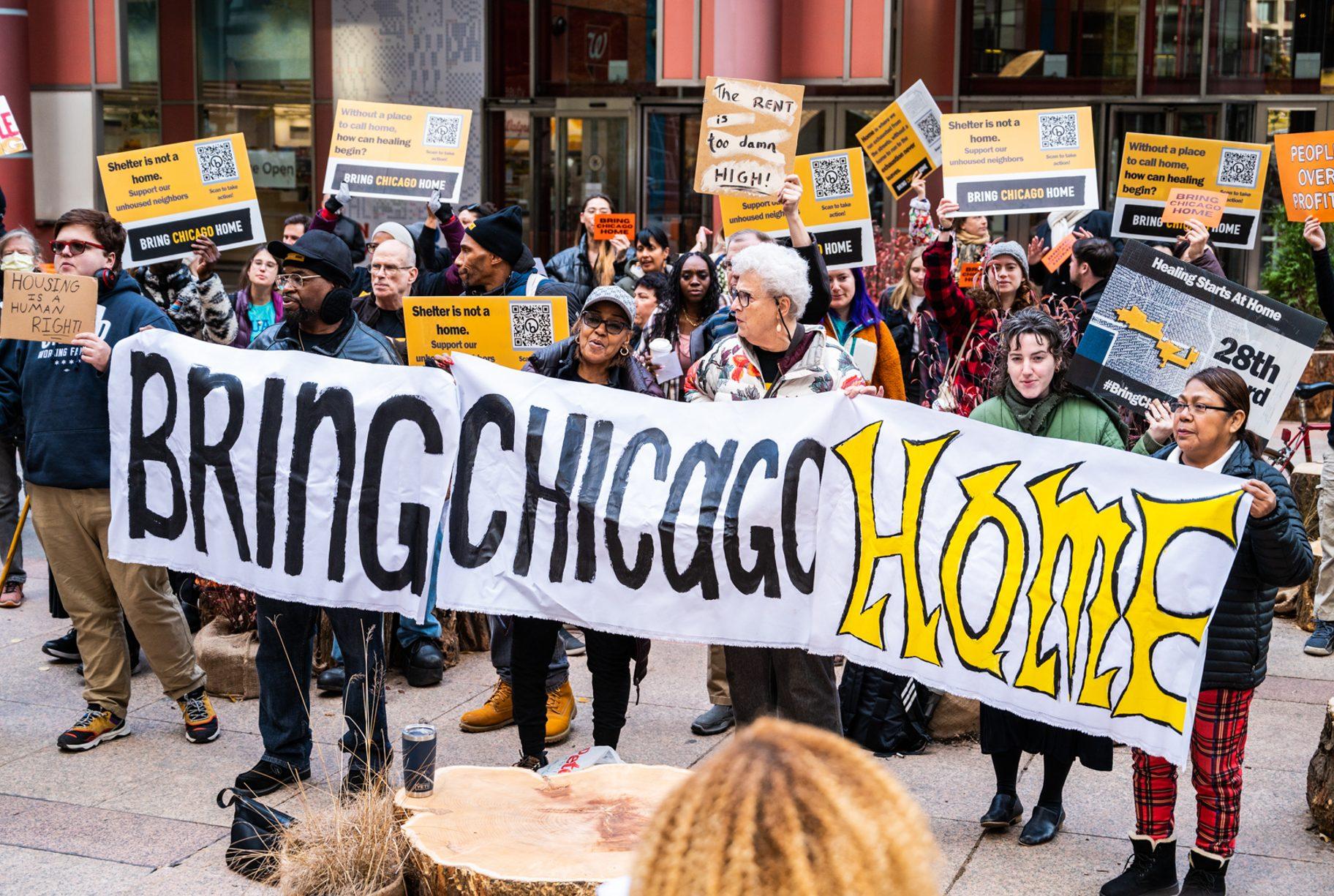 Dozens rally outside the Thompson Center for the Bring Chicago Home ballot initiative before a City Council meeting on Nov. 7, 2023. (Colin Boyle / Block Club Chicago)