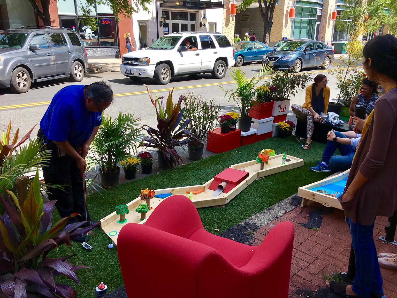 A miniature golf course takes over a parking space for PARK(ing) Day. (airbus777 / Flickr)