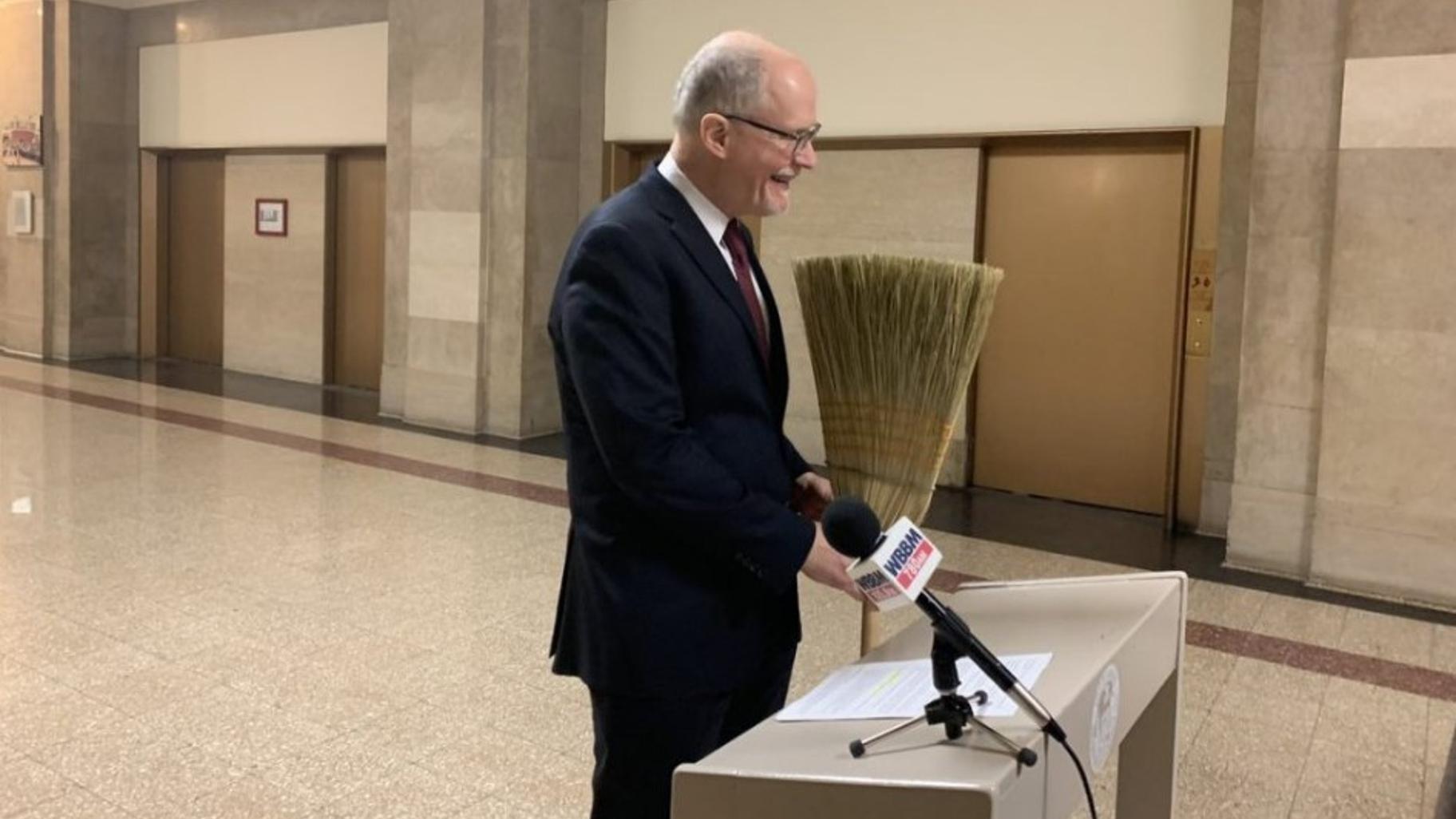 During the 2019 mayoral election, candidate Paul Vallas often appeared at news conferences brandishing a broom to illustrate his vow to clean up City Hall and rid it of corruption. (Heather Cherone / WTTW News)
