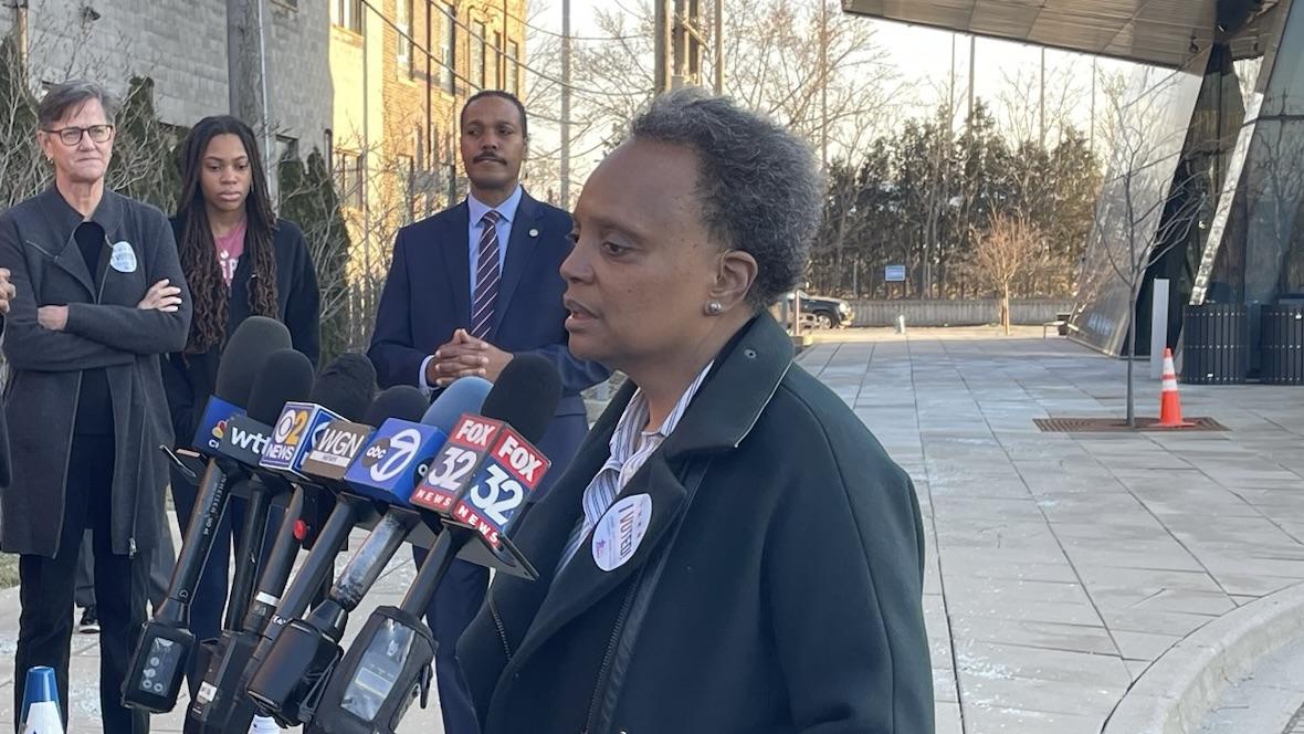 Mayor Lori Lightfoot fields questions from the news media on Feb. 20, 2023, after voting at Northeastern Illinois University. (Heather Cherone/WTTW News)