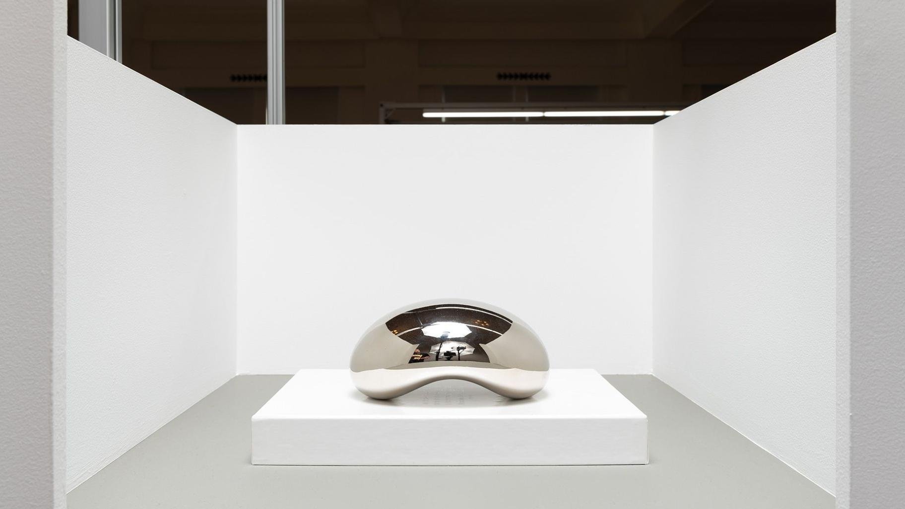 In 2023, the gallery Pickleman presented a tiny version of a Chicago landmark with this “mini bean” by Anish Kapoor. (Roland Miller / Barely Fair via CNN Newsource)