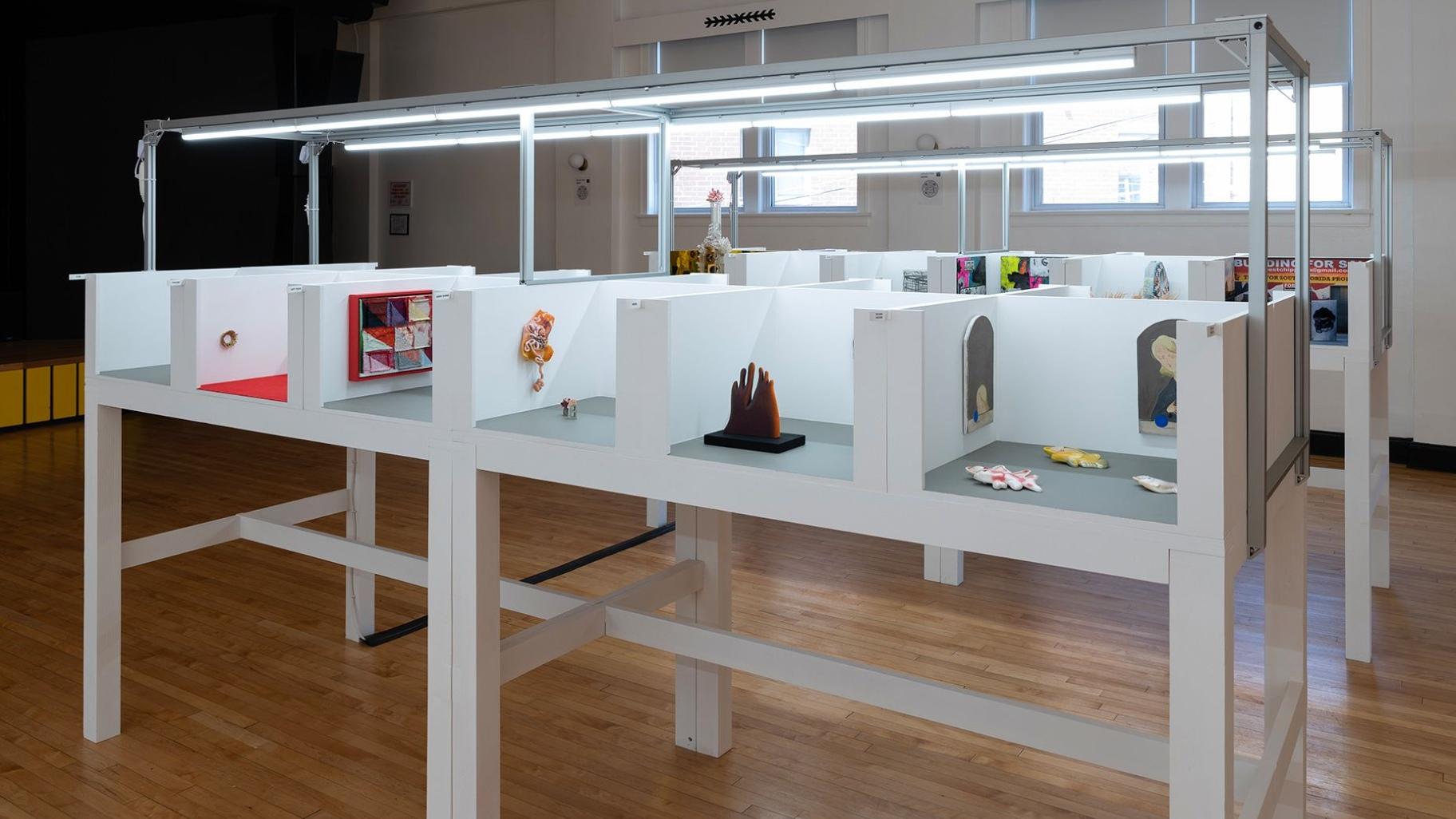 Barely Fair began as a joke between the co-founders of the artist space Julius Caesar, but they quickly realized its potential as a serious art fair. Pictured here are a selection of booths on display in 2023. (Roland Miller / Barely Fair via CNN Newsource)