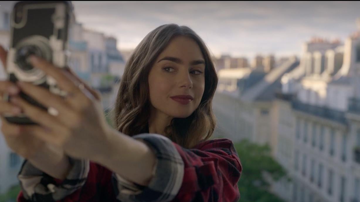 Lily Collins as the titular Emily in "Lily Collins as the titular Emily in “Emily in Paris.” (Netflix) in Paris." (Netflix)