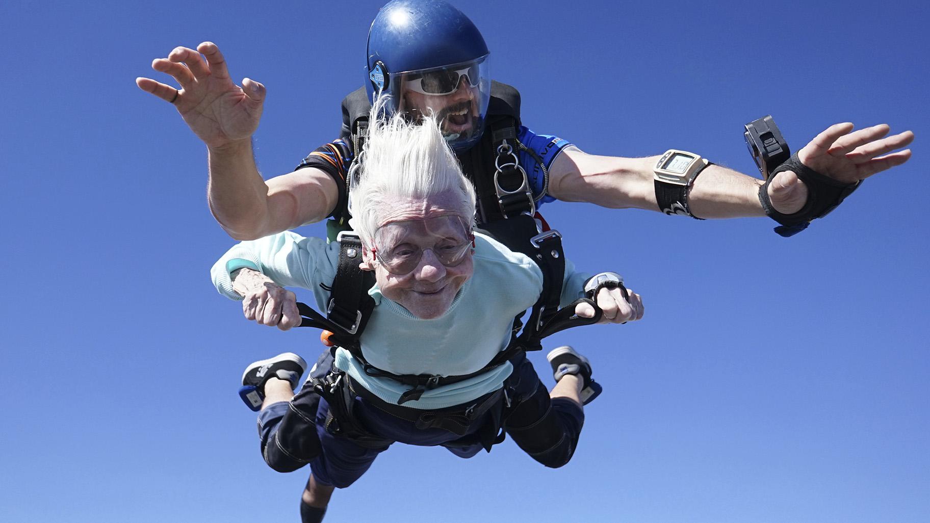 This photo provided by Daniel Wilsey shows Dorothy Hoffner, 104, falling through the air with tandem jumper Derek Baxter as she becomes the oldest person in the world to skydive, Sunday, Oct. 1, 2023, at Skydive Chicago in Ottawa, Ill. (Daniel Wilsey via AP, File)
