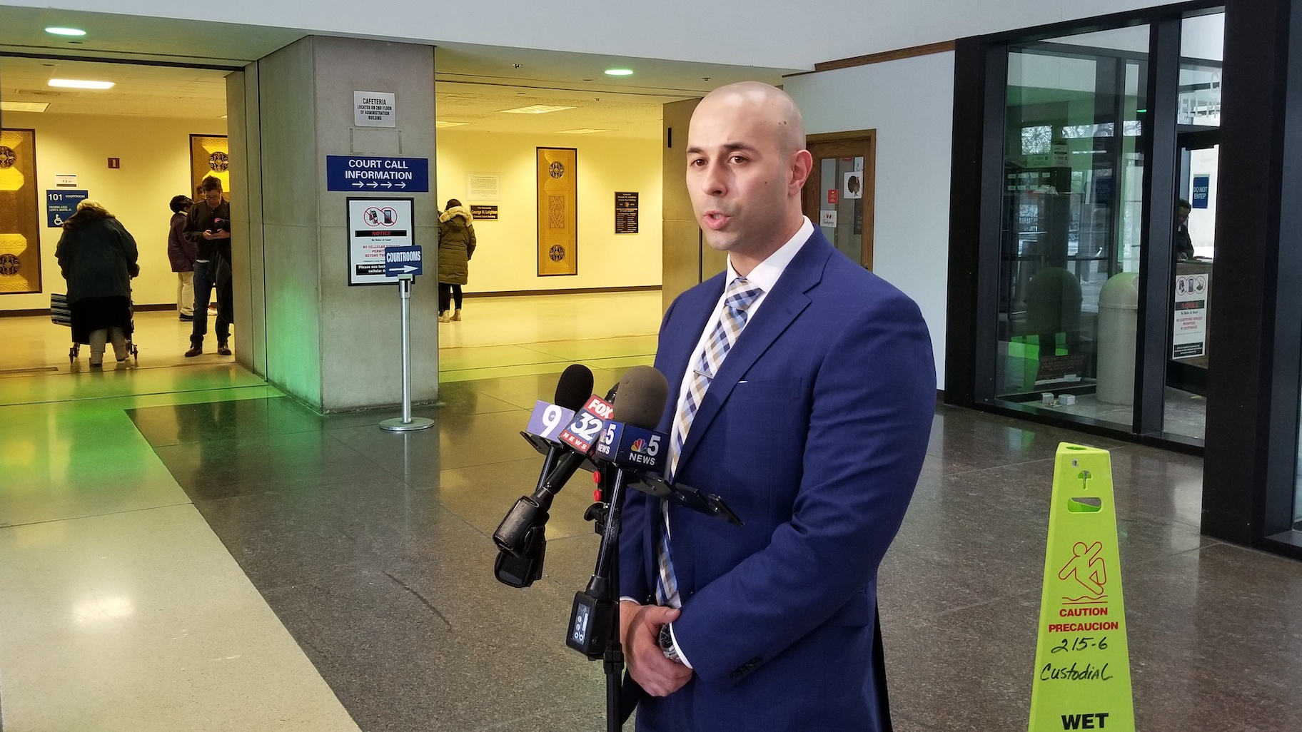 Dante Servin’s attorney Matt Fakhoury speaks with reporters Thursday, Nov. 14, 2019 inside the Cook County Criminal Courts Building. (Matt Masterson / WTTW News)