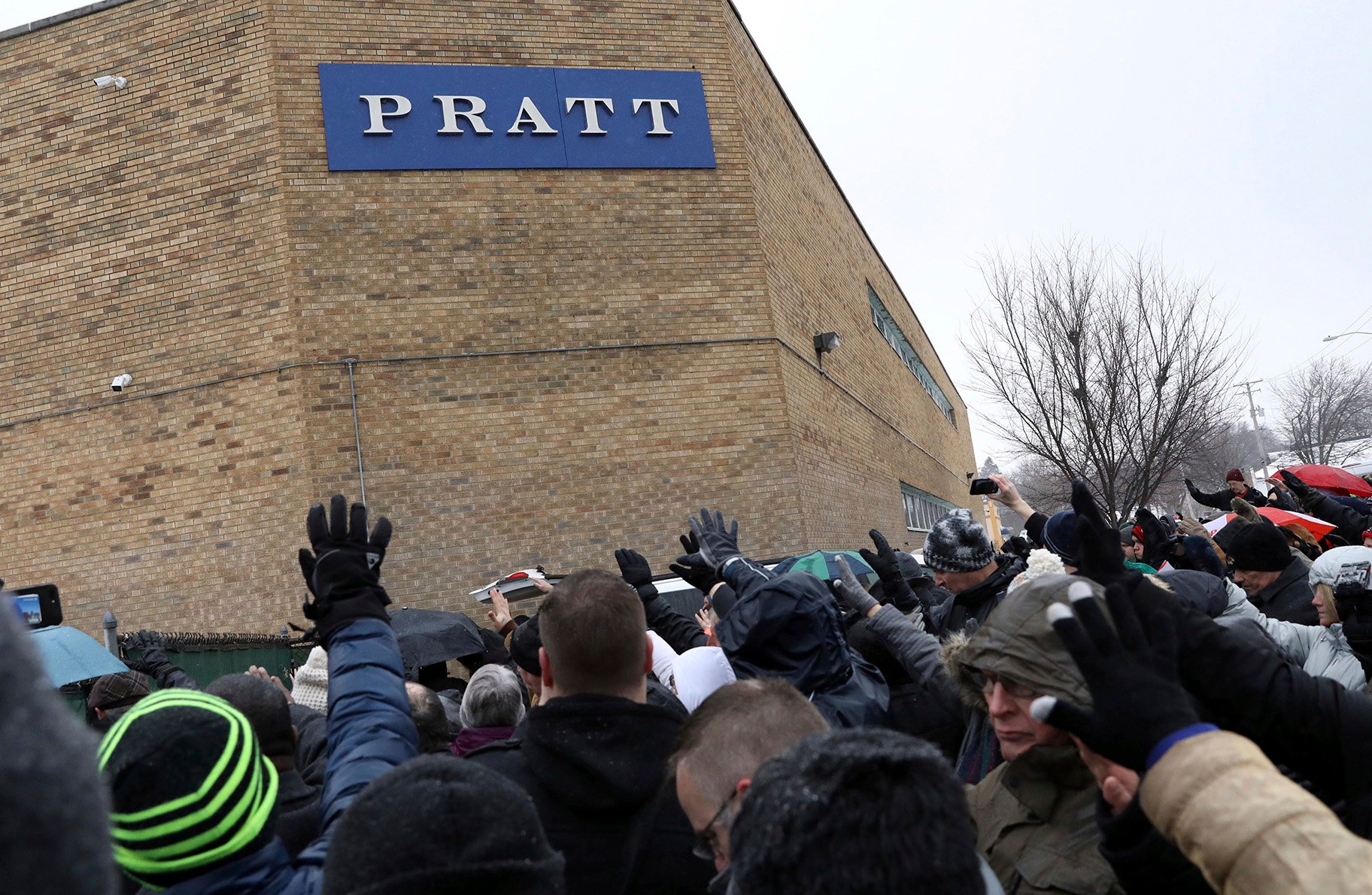 Family, friends and community members attend a vigil Sunday, Feb. 17, 2019, in Aurora, Illinois. (AP Photo / Nam Y. Huh)