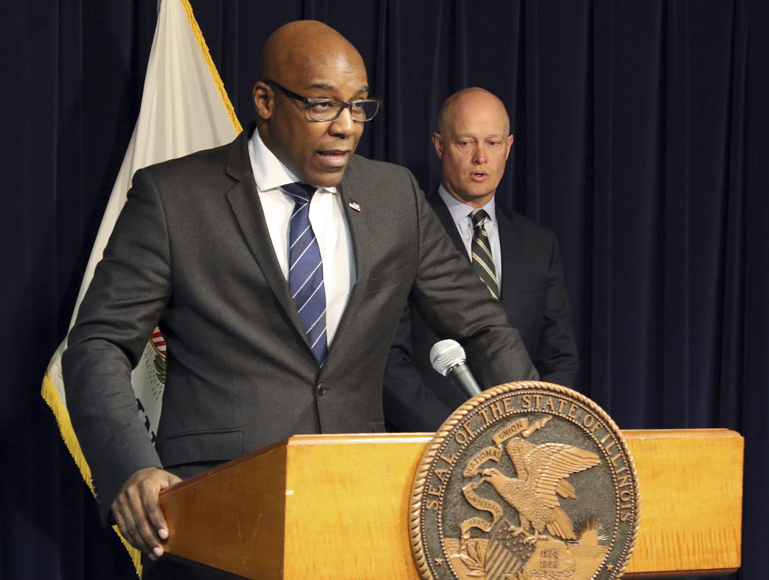Attorney General Kwame Raoul, left, and Kane County State’s Attorney Joseph McMahon speak during a news conference Monday, Feb. 11, 2019. (AP Photo / Noreen Nasir)