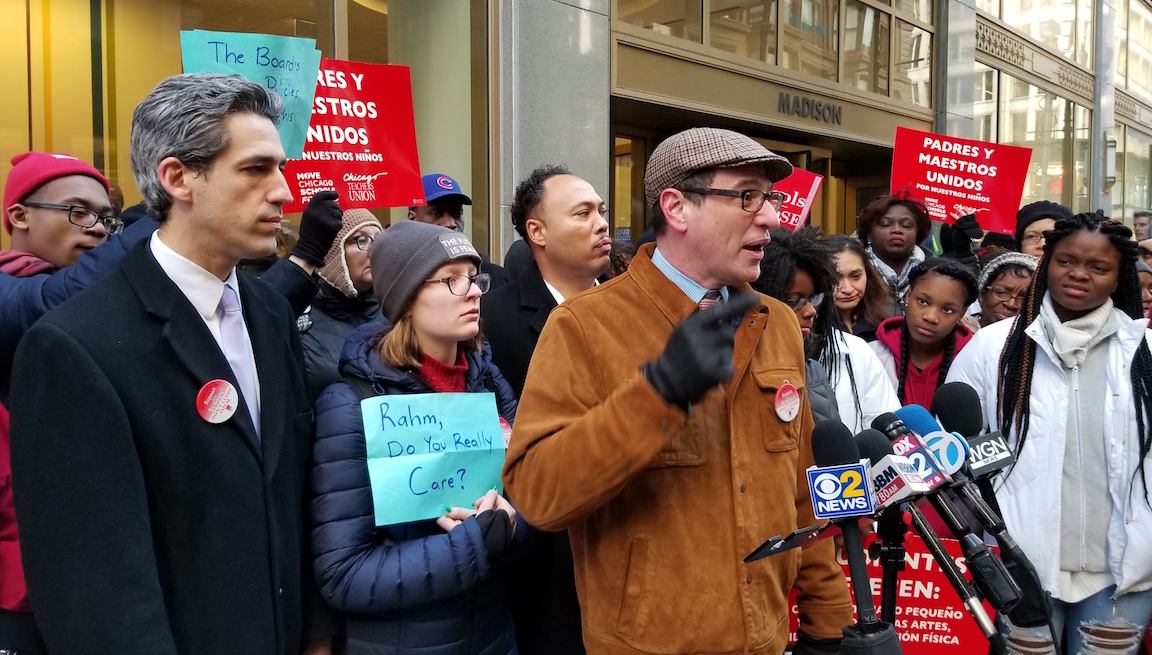 Chicago Teachers Union Vice President Jesse Sharkey, center, also spoke out against the district's Englewood plan prior to Wednesday's Board of Education meeting. (Matt Masterson / Chicago Tonight)