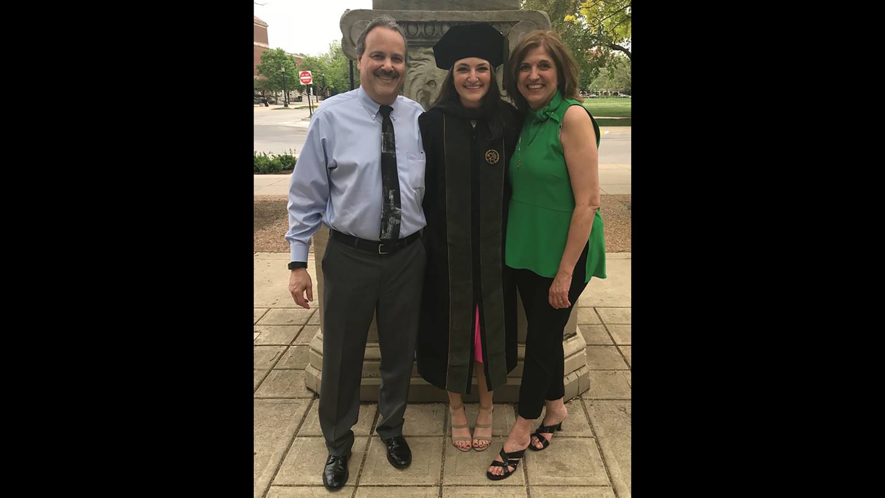 Dayna Less, center, with her father Brian and mother Teena. (Provided photo)