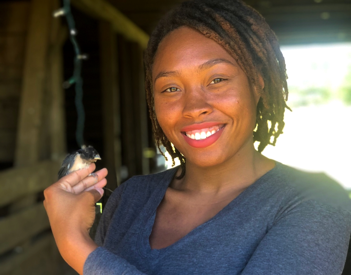 Deja Perkins, with a barn swallow. (Courtesy of Deja Perkins)