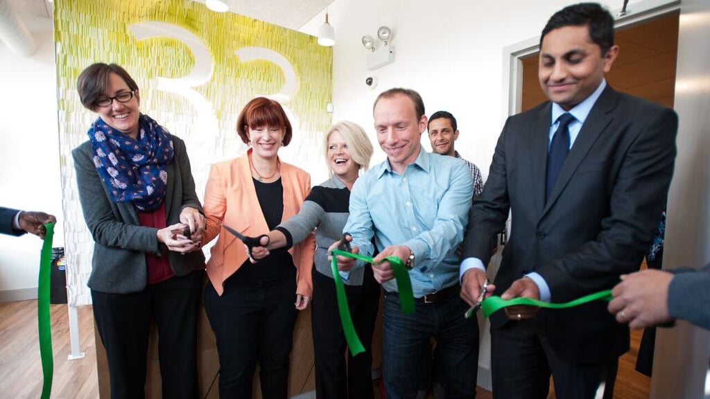 47th Ward Alderman Ameya Pawar (far right) and Dispensary 33 owner Zachary Zises (2nd to right) attend the center's ribbon-cutting ceremony along with elected state officials and residents. (Courtesy of Dispensary 33)
