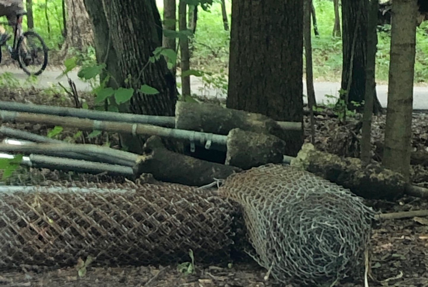 Construction site waste, dumped near a forest preserve trail. (Courtesy of the Forest Preserve District of Cook County)