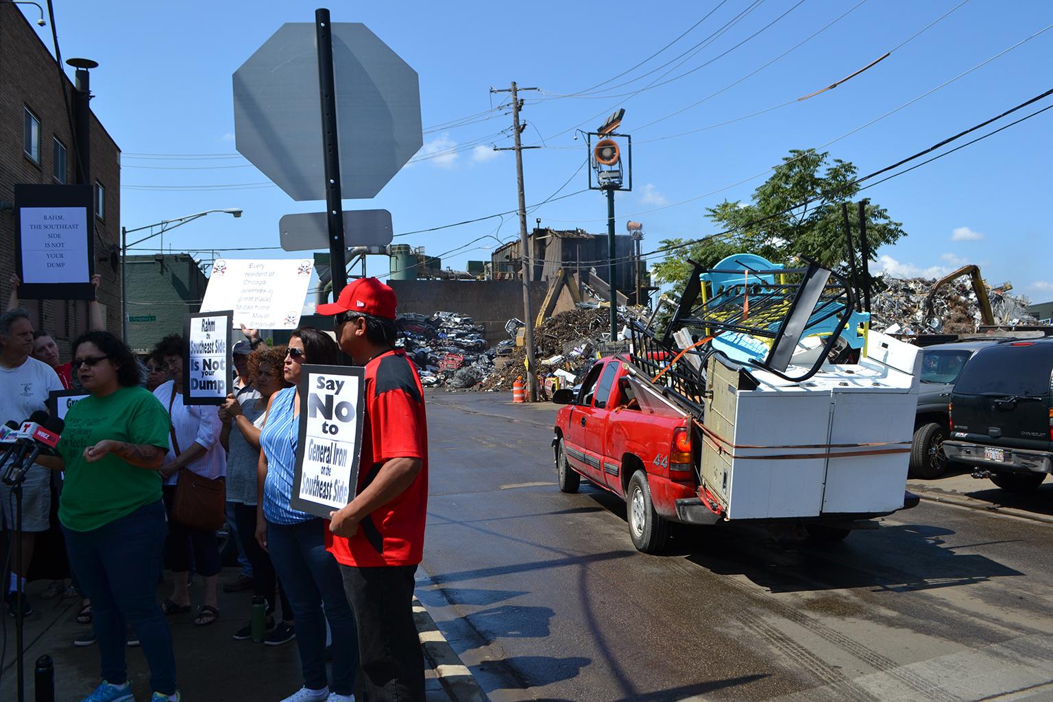 Southeast Side residents protest outside General Iron’s scrap metal yard in Lincoln Park, in 2018. (Alex Ruppenthal / WTTW News)