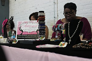 Owner of "Adorned by Glenda" hosts a booth at the Power Lunch