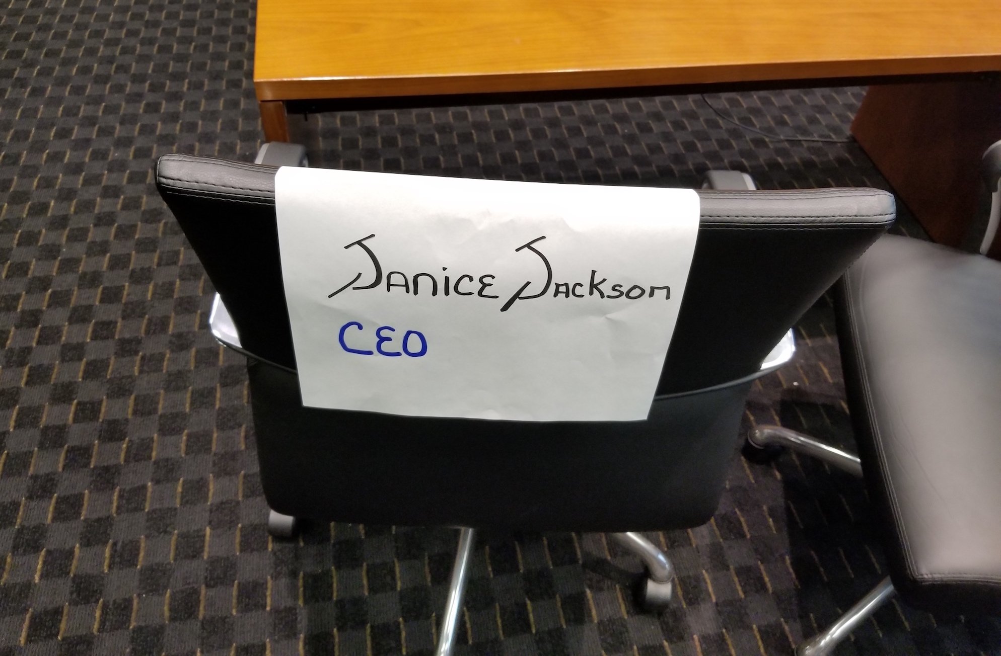A chair reserved at Wednesday’s hearing for Chicago Public Schools CEO Janice Jackson sat vacant throughout the day. (Matt Masterson / Chicago Tonight)