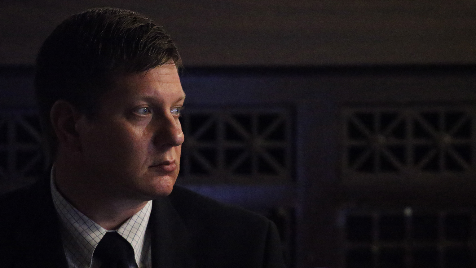 Chicago police Officer Jason Van Dyke listens to court proceedings on Monday, Sept. 17, 2018 as lights are turned off for a video clip. (Antonio Perez / Chicago Tribune / Pool)