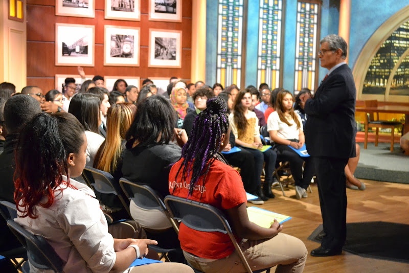 "Chicago Tonight" host Phil Ponce chats with Mikva Challenge students before the forum in April 2015.