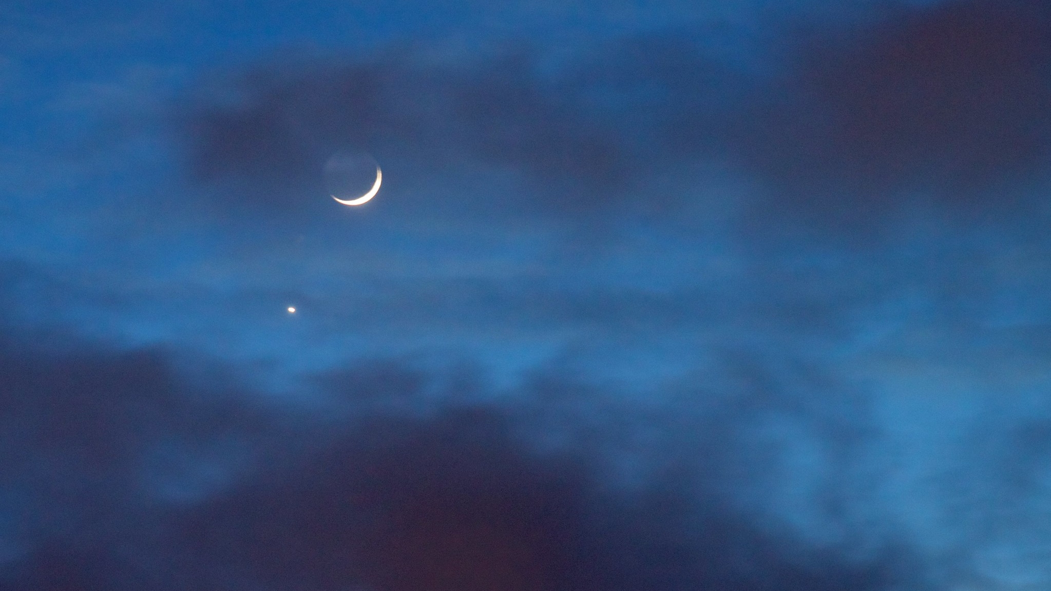 The moon and Venus are in conjunction, as seen in this image from 2015. (Tuchodi / Flickr)