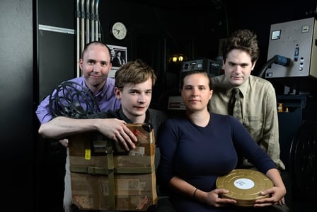 NEIU assistant professor Shayne Pepper, left, and NWCFS members, left to right, Julian Antos, Rebecca Hall and Kyle Westphal.