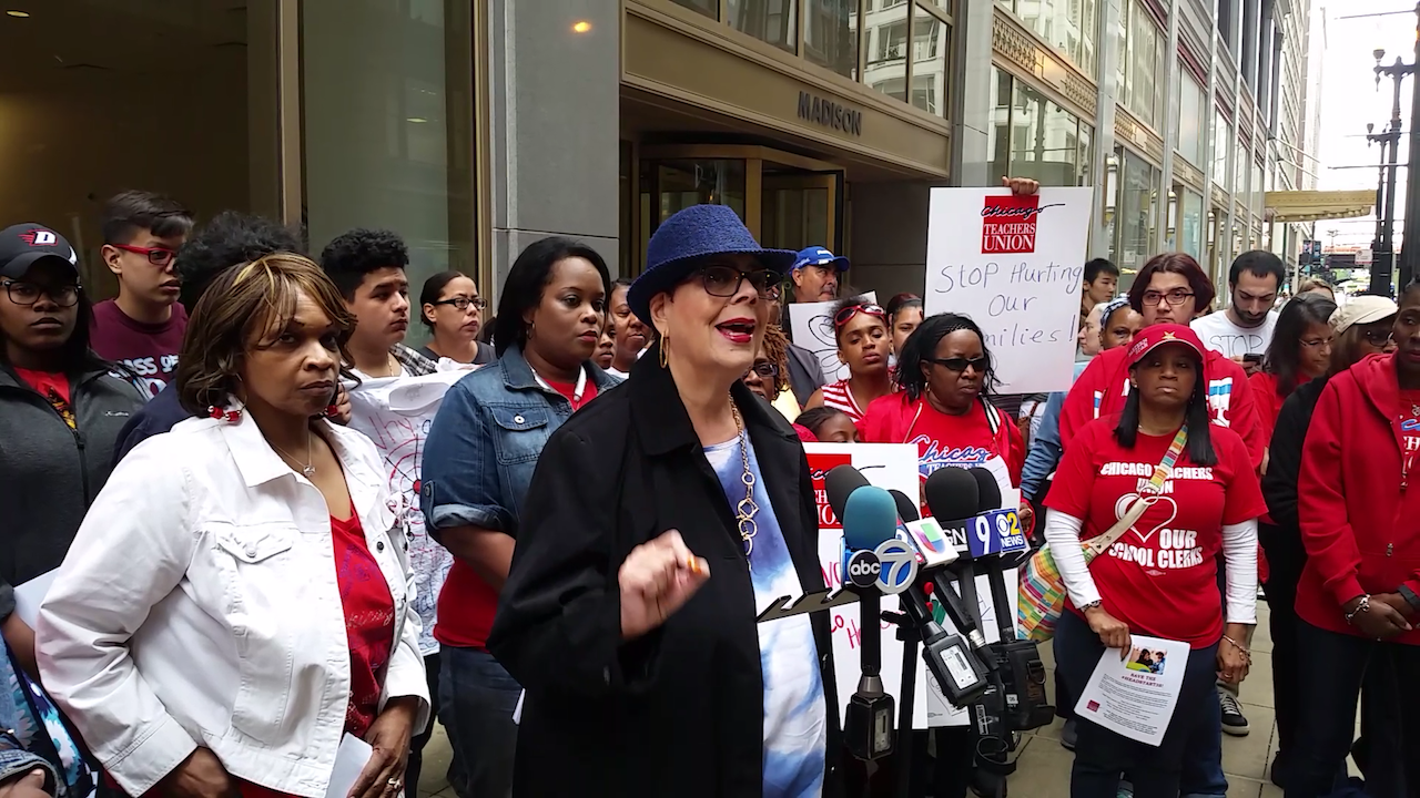 Chicago Teachers Union President Karen Lewis joins a rally outside CPS on Wednesday to protest the firing of more than 30 pre-K assistants. (Matt Masterson / Chicago Tonight)