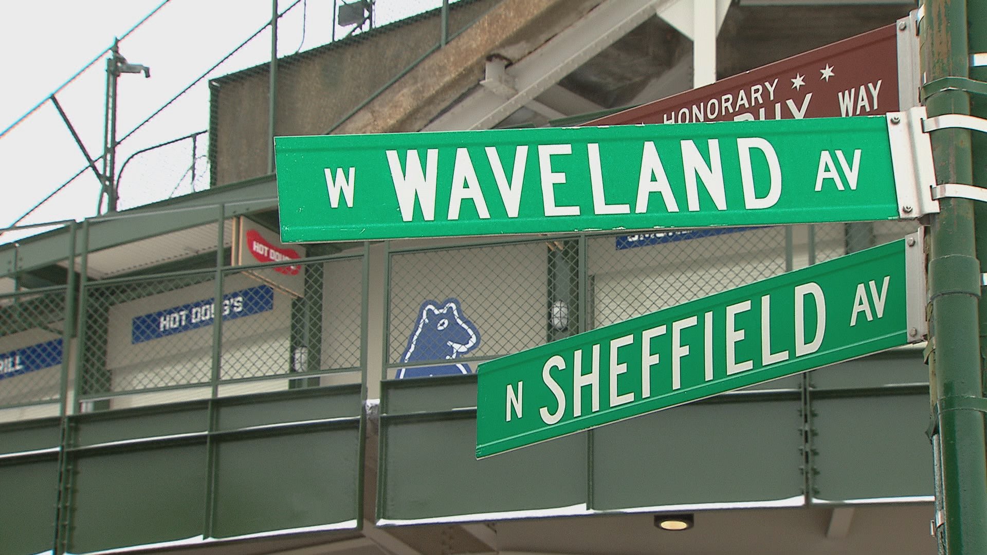 Rooftop Owners Want Restraining Order To Stop Wrigley Signs - CBS