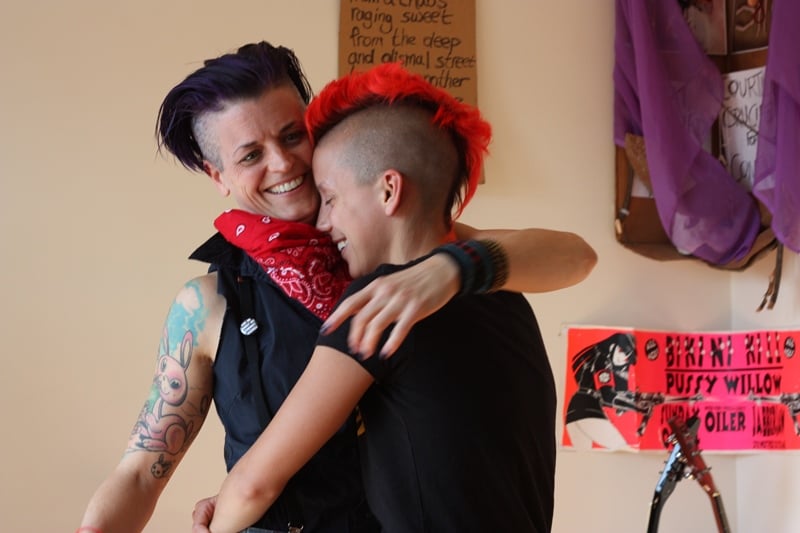 Molly Brennan, left, and Malic White in their Humboldt Park apartment. (Chloe Riley)