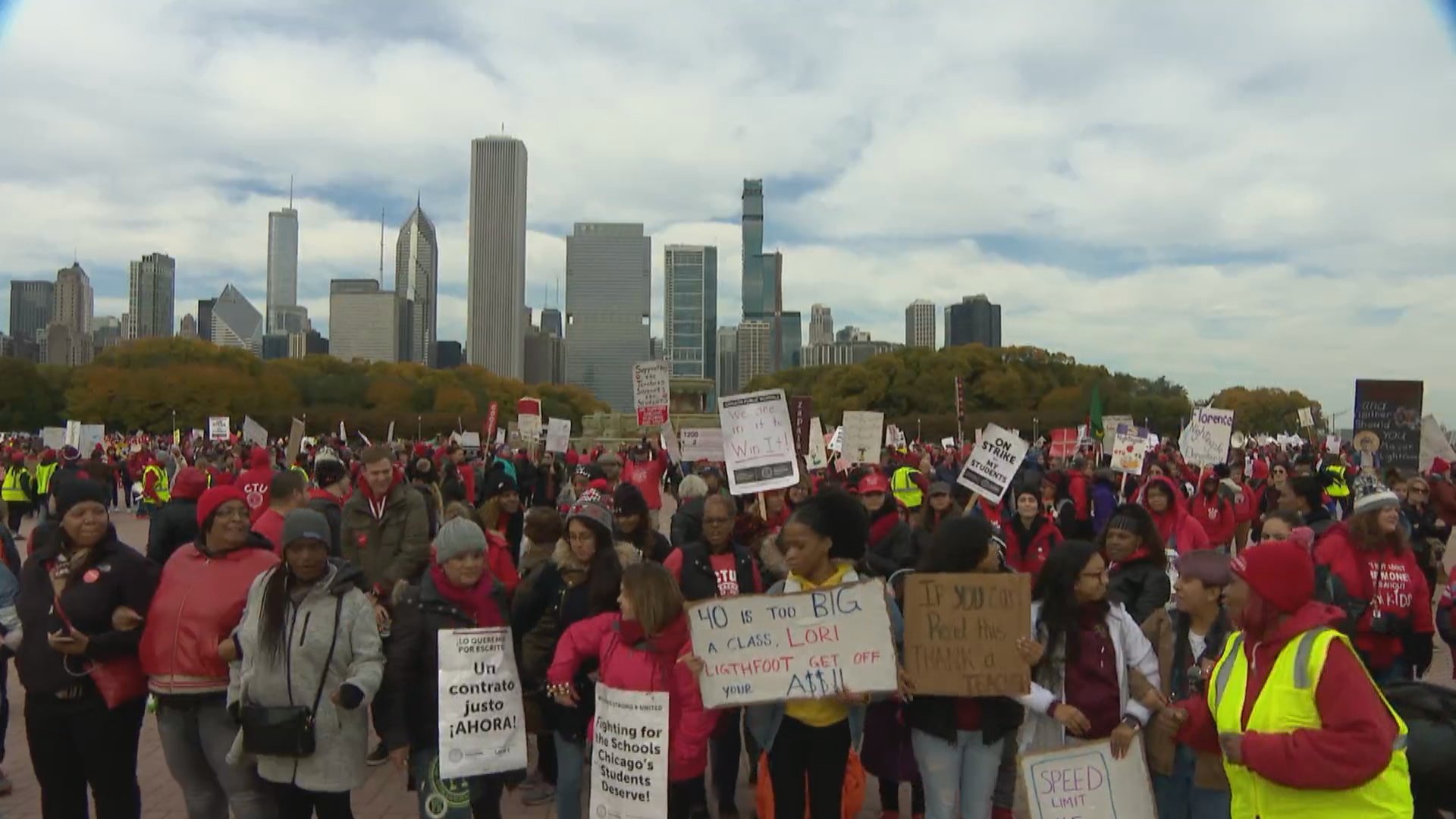 Members of the Chicago Teachers Union gathered for a rally at Buckingham Fountain on Friday afternoon, the seventh day of their ongoing strike. (WTTW News)