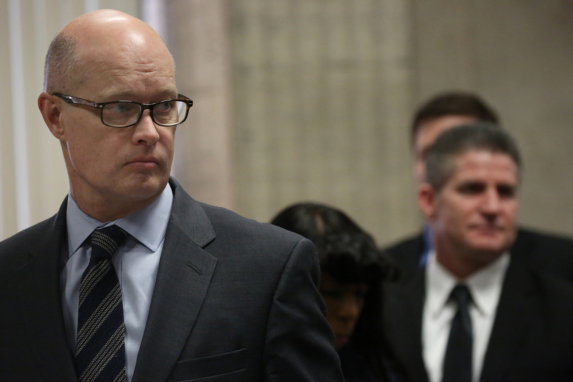 Special prosecutor Joseph McMahon, left, and defense attorney Daniel Herbert approach the bench at a hearing for Jason Van Dyke hearing at the Leighton Criminal Court Building in Chicago on Thursday, March 8, 2018. (Nancy Stone / Chicago Tribune / Pool)