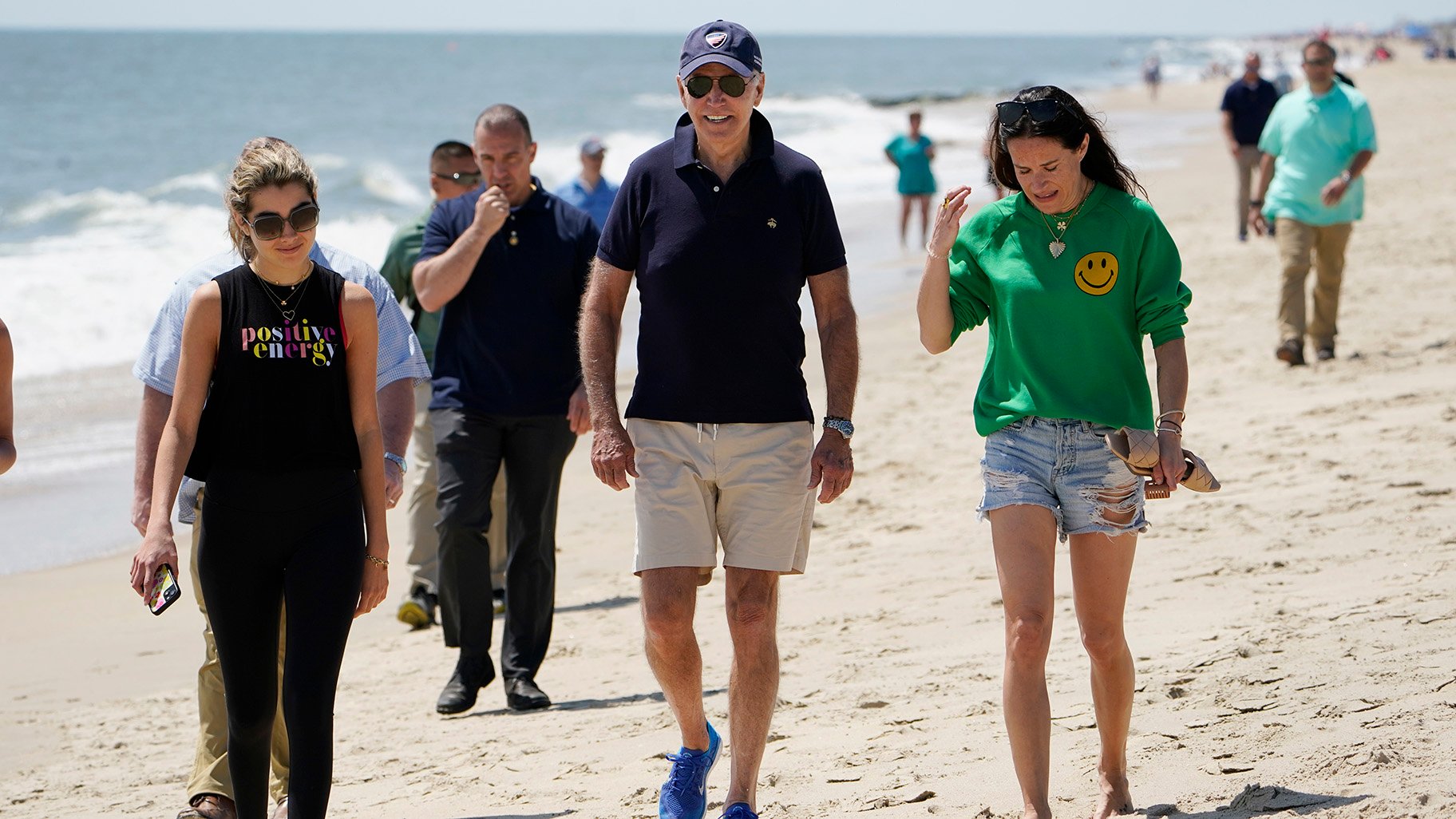 Joe Biden walking on a beach