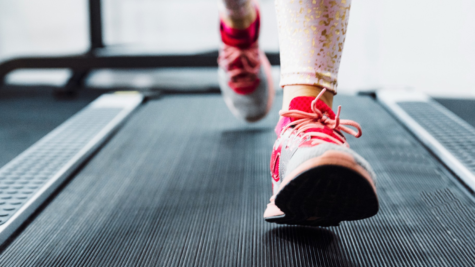 Woman running on treadmill. Woman running on treadmill.