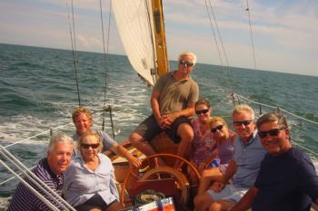 The author (left) aboard <em>Glide</em> with Ethel Kennedy, Ted Kennedy Jr., Max Kennedy, Sheila Kennedy (wife of Chris), Kiki Kennedy (wife of Ted Jr.), Chris Kennedy, and family friend David Nunes. Photo by crewman, August 6, 2012.