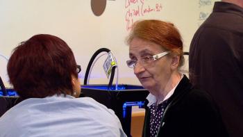 Here, a visitor, right, listens to a tutorial from a CPL staffer; CPL staffers are on hand throughout this 6-month period to teach library visitors the art of 3-D printing