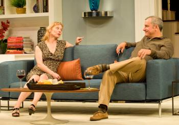 (left to right) Margaret (ensemble member Mariann Mayberry) catches up with her old flame, Mike (Keith Kupferer), in Steppenwolf Theatre Company’s production of Good People by Pulitzer Prize-winner David Lindsay-Abaire, directed by ensemble member K. Todd Freeman. Photo Credit: Michael Brosilow 