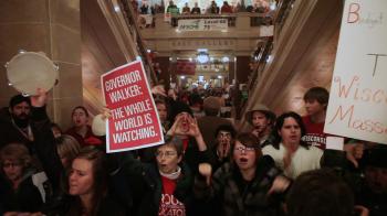 Protestors swarm Wisconsin’s capitol in anger about Gov. Walker’s decision to end collective bargaining; Courtesy Kartemquin Films and 371 Productions