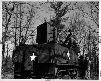 A halftrack with a 500 speaker mounted on the back for sonic deception; courtesy: National Archives