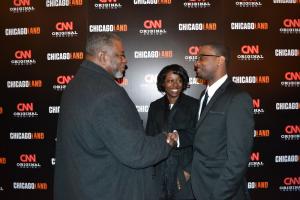 Theatergoers chat in the lobby after the viewing of the first episode