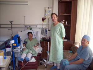 Lindsay Porter's kidney donor stands beside her hospital bed