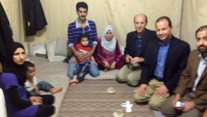 Dr. Sahloul having tea with Asma (left) and others