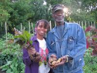 Two volunteers at The Jackson Park Urban Farm and Community Allotment Garden, established by Growing Power in 2007.