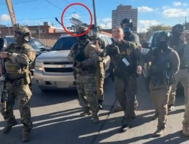 An image taken from a video entered as evidence in the court case, showing Border Patrol chief Gregory Bovino firing tear gas, circled in red by lawyers for the Chicago Headline Club, at a crowd of protestors. (Provided)
