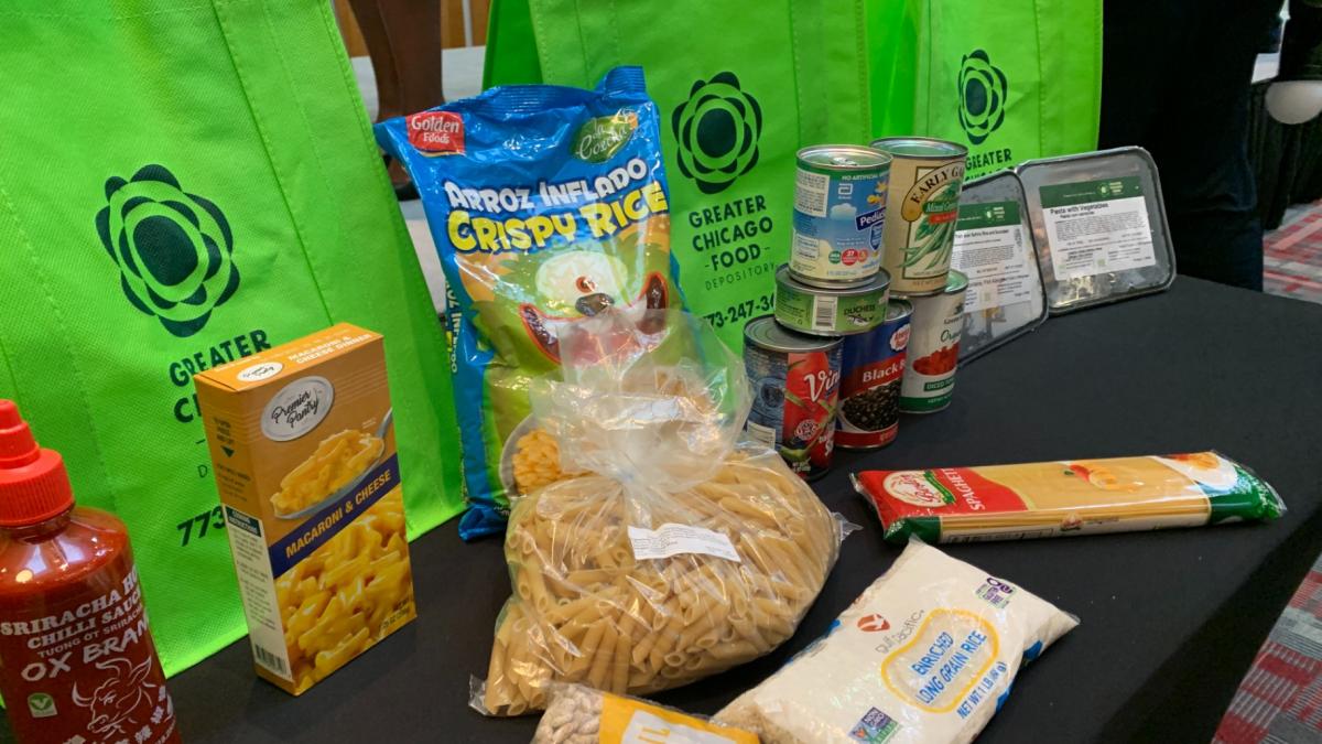 Food pantry items during an event at Kennedy-King College on Sept. 30, 2025, for the announcement of a new initiative by the City Colleges of Chicago and Greater Chicago Food Depository to address food insecurity. (Eunice Alpasan / WTTW News)