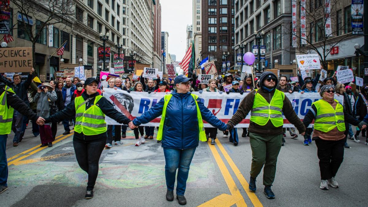 Tens of thousands came out Saturday, April 5, 2025, in downtown Chicago to rally against President Donald Trump’s policies, everything from reciprocal tariffs to his immigration actions. (Sonya Dymova / Medill Illinois News Bureau)