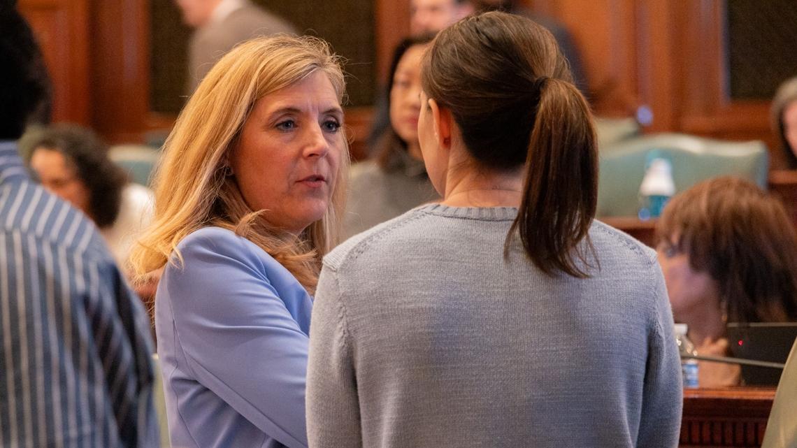 Rep. Terra Costa Howard, D- Glen Ellyn, speaks to a House colleague shortly after making a speech on April 11, 2025, in favor of her bill creating new homeschool oversight in Illinois. (Andrew Adams / Capitol News Illinois)