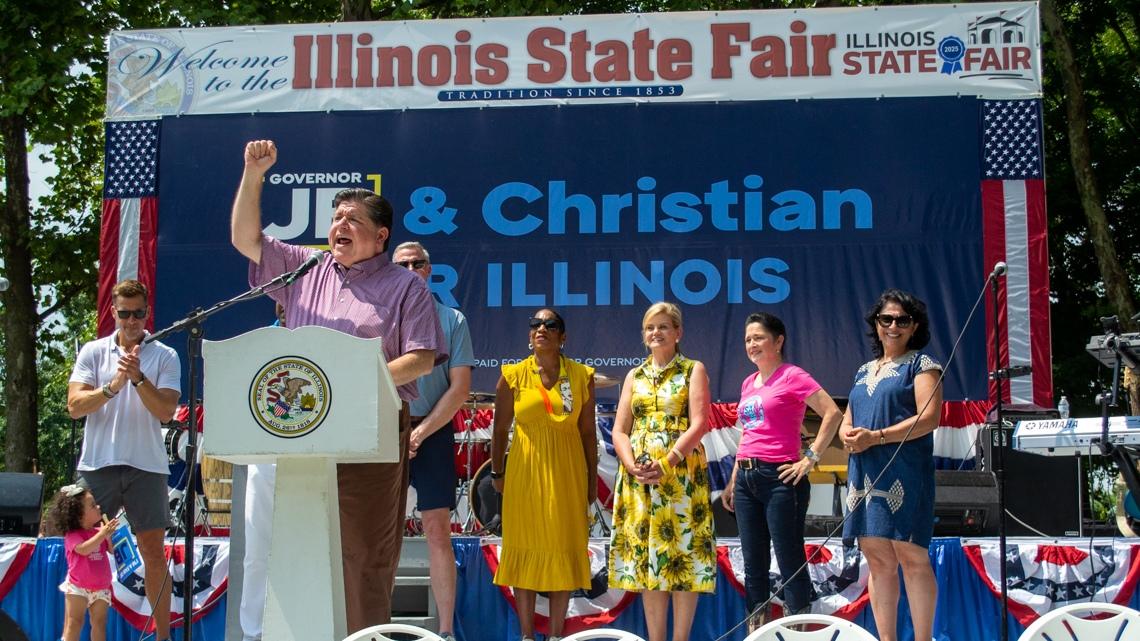 Gov. JB Pritzker addresses the crowd and receives cheers from his fellow party leaders at a Governor’s Day rally at the Illinois State Fair on August 13, 2025. (Jerry Nowicki / Capitol News Illinois) 