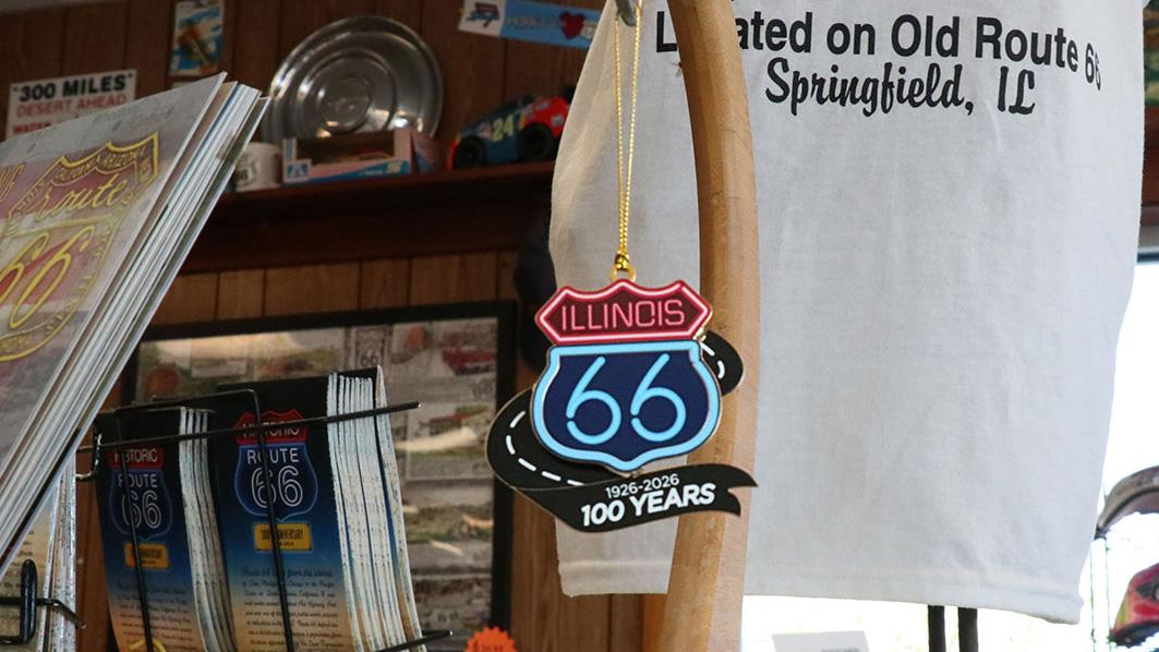 A Route 66 centennial logo ornament hung on display at Cozy Dog Drive In. (Chloe Park / Medill Illinois News Bureau)