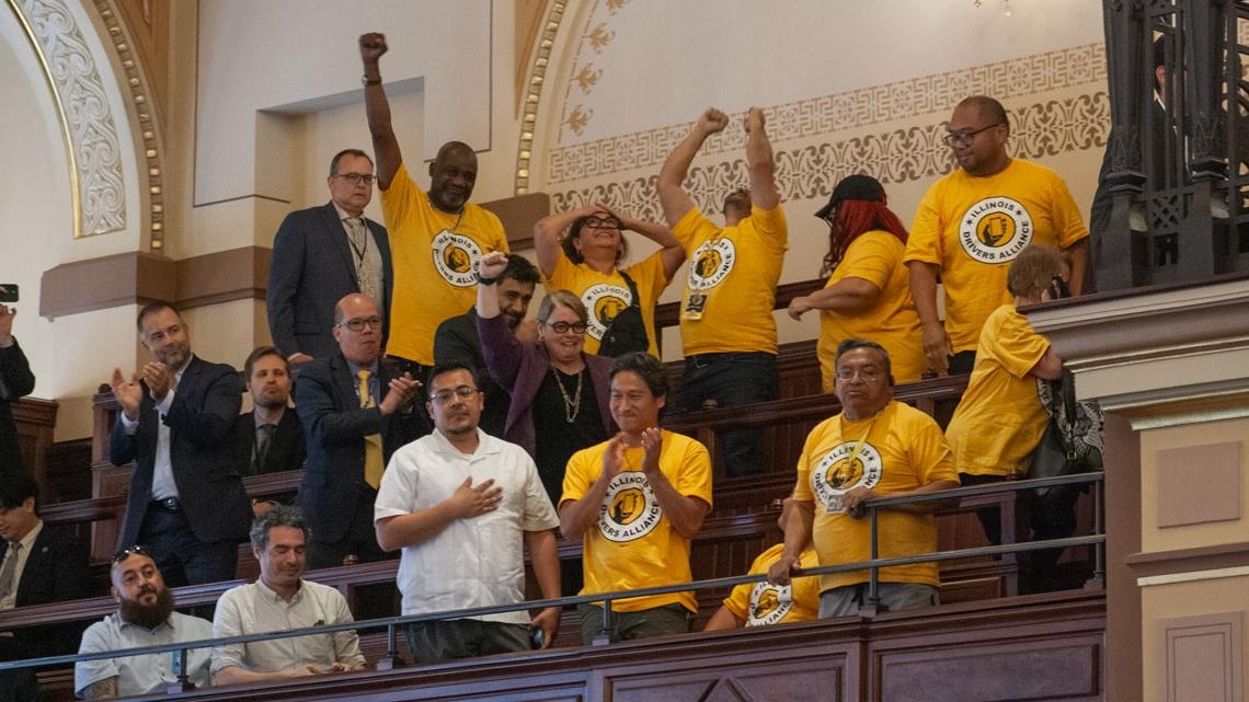 Supporters of the rideshare union bill celebrate in the Senate gallery after the bill passed on the floor. (Jenna Schweikert / Capitol News Illinois)