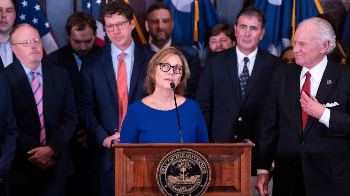 Newly appointed U.S. interim Senator, Darline Graham Nordone, with South Carolina Gov. Henry McMaster, right, speaks to members of the press after being appointed of to fill the vacancy created by the passing of her brother, U.S. Senator Lindsey Graham, at the statehouse Monday, July 13, 2026, in Columbia, S.C. (AP Photo / Sean Rayford)