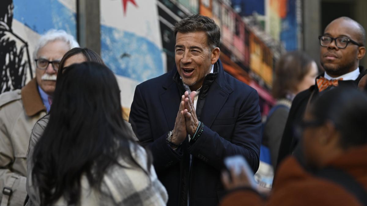 Illinois Secretary of State Alexi Giannoulias lines up on Oct. 19, 2026, to file petitions for a spot on the 2027 Chicago mayoral ballot. (Victor Hilitski / WTTW News)