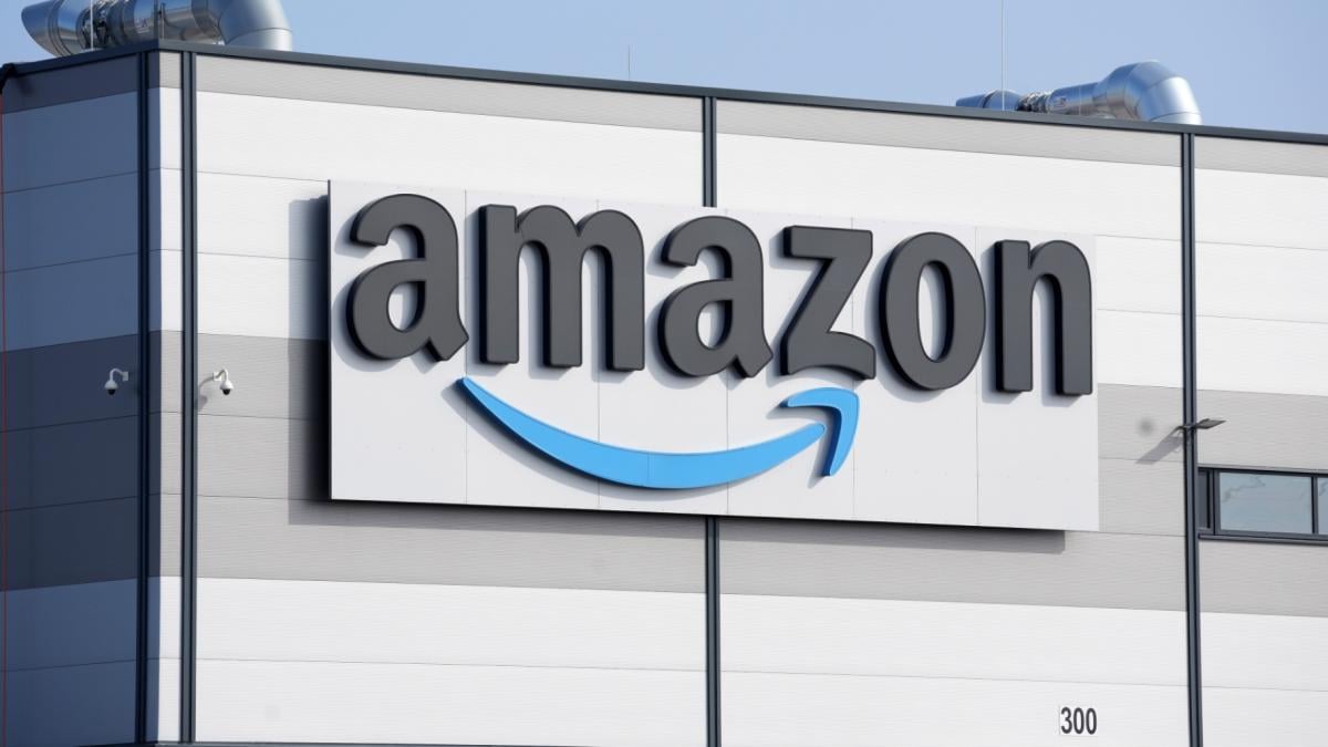 An Amazon company logo marks the facade of a building, March 18, 2022, in Schoenefeld near Berlin. (AP Photo / Michael Sohn, File)